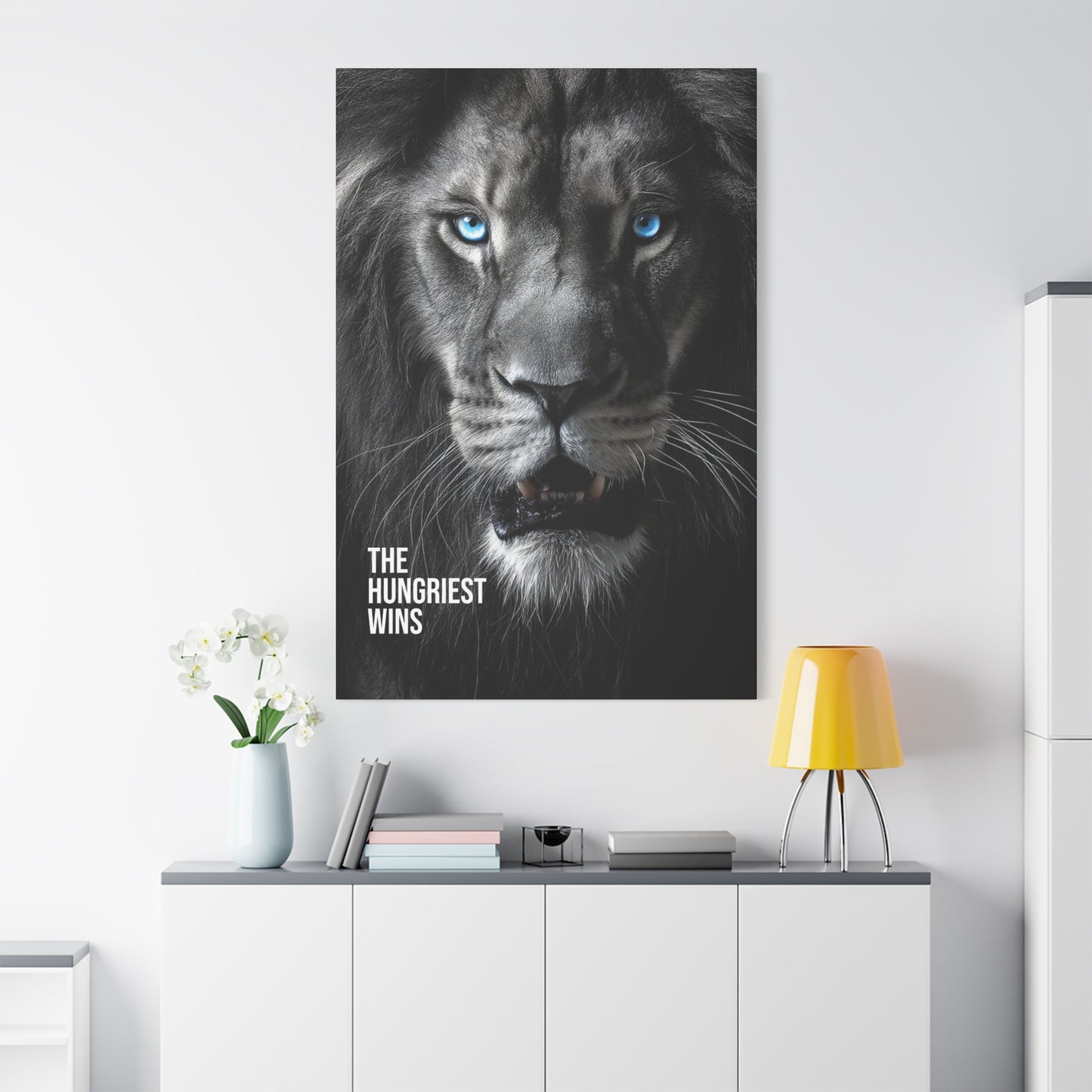 Canvas Print - Intense Lion Stare Down with Bright Blue Eyes 'The Hungriest Wins'