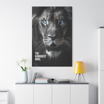 Canvas Print - Intense Lion Stare Down with Bright Blue Eyes 'The Hungriest Wins'